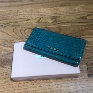 Miu Miu wallet aqua blue color croc.  embossed leather flap